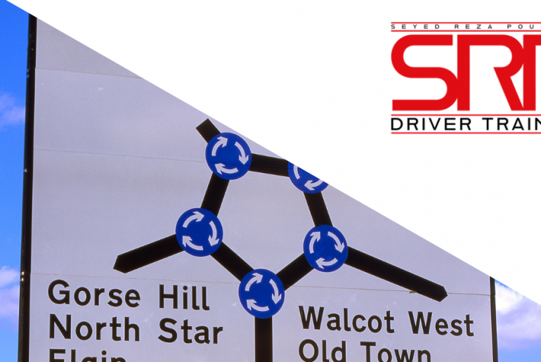 A road sign showing the Magic Roundabout in Slough.